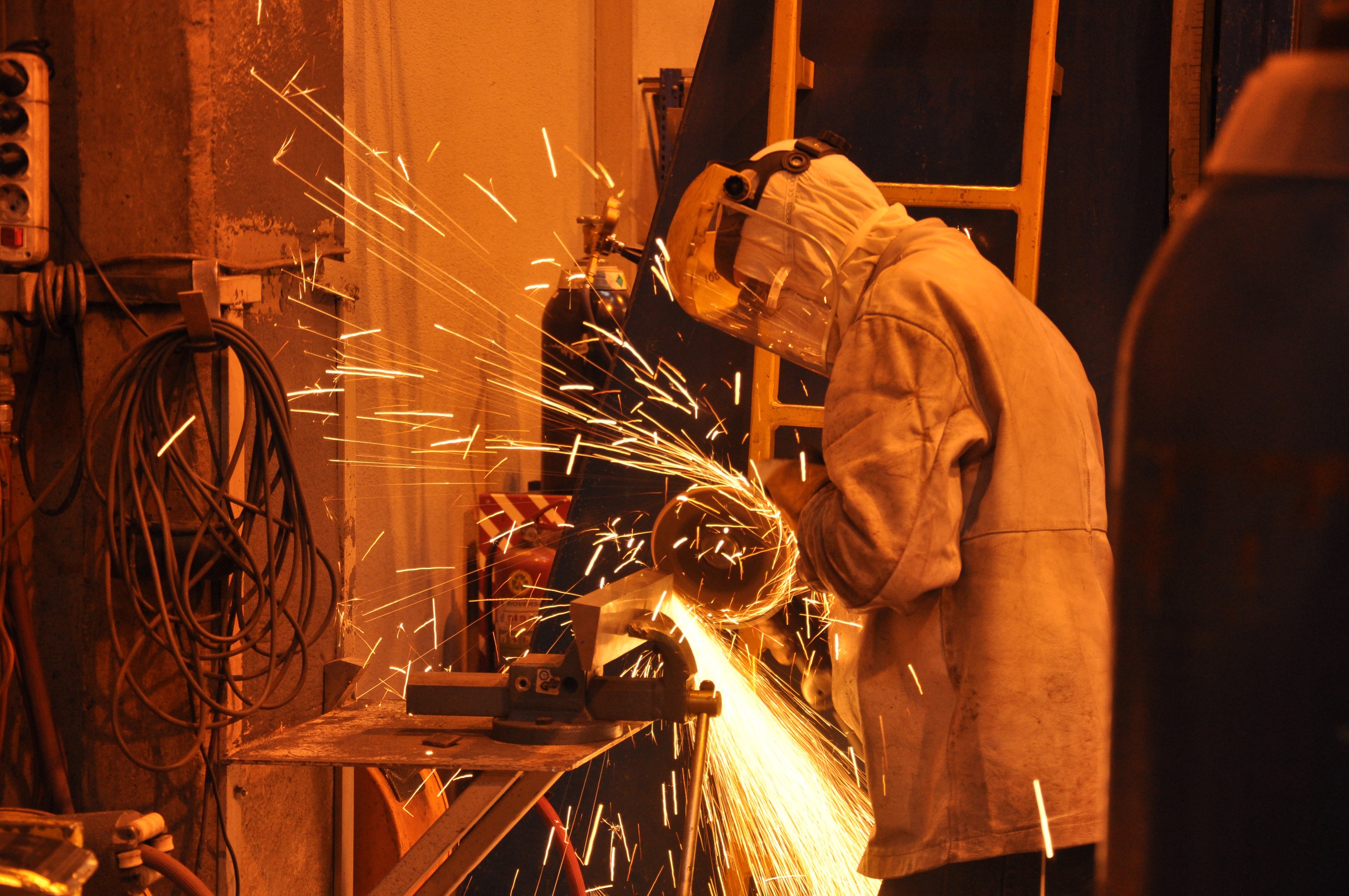 A Person Standing Near the Grinder